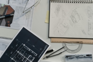 Picture of architecture notebook and sketches, measurement tools; photo by: Photo by Tima Miroshnichenko