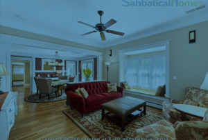 Welcoming living room with a couch and coffee table in a SabbaticalHomes.com rental home.