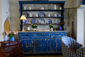 House with blue china hutch