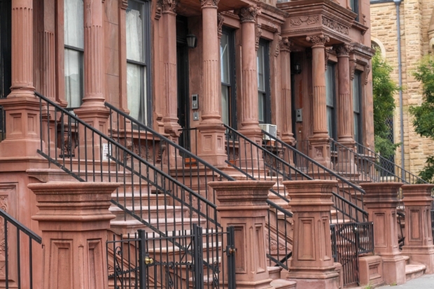 Exterior of city buildings with front porches.